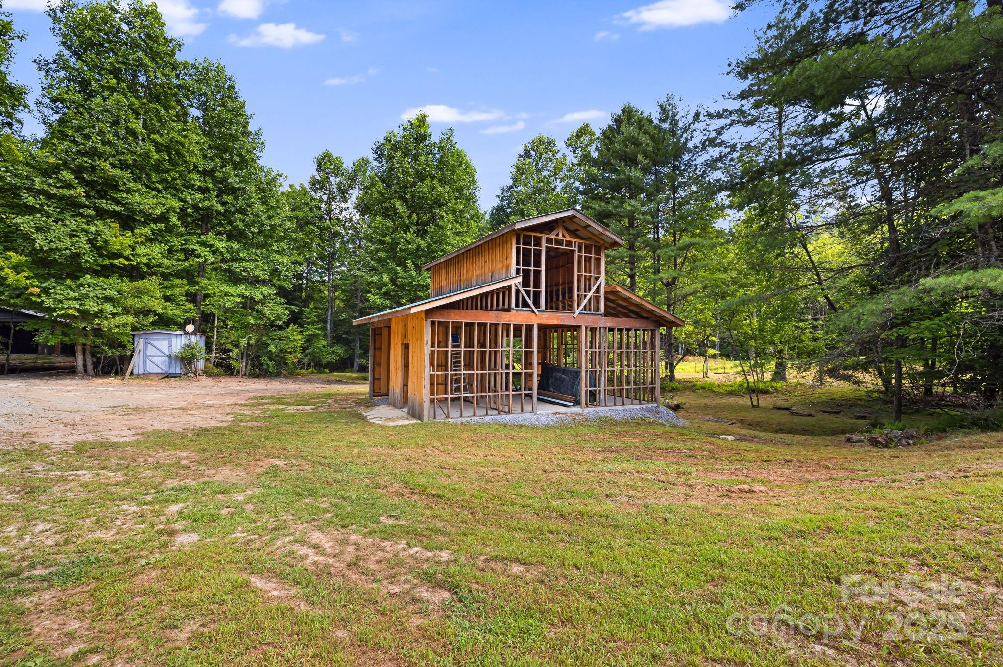1101 Line Runner Ridge Road Rosman, NC 28772 - Photo 38 of 47 a view of a house with a yard