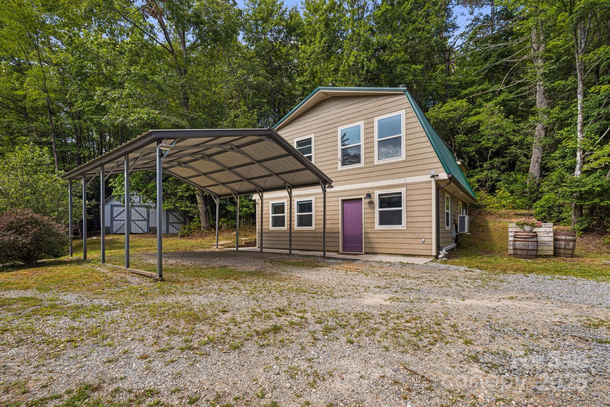 1101 Line Runner Ridge Road Rosman, NC 28772 - Photo 6 of 47 a front view of a house with a yard