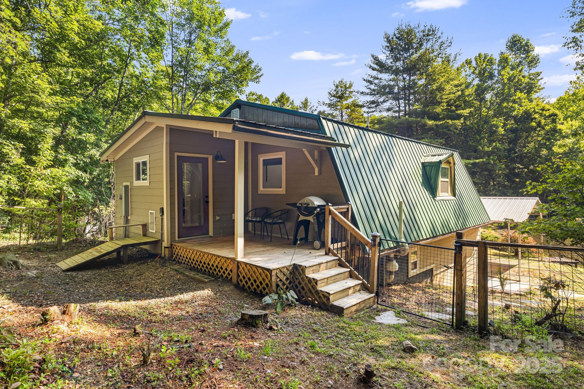 1101 Line Runner Ridge Road Rosman, NC 28772 - Photo 7 of 47 a view of a house with backyard and sitting area