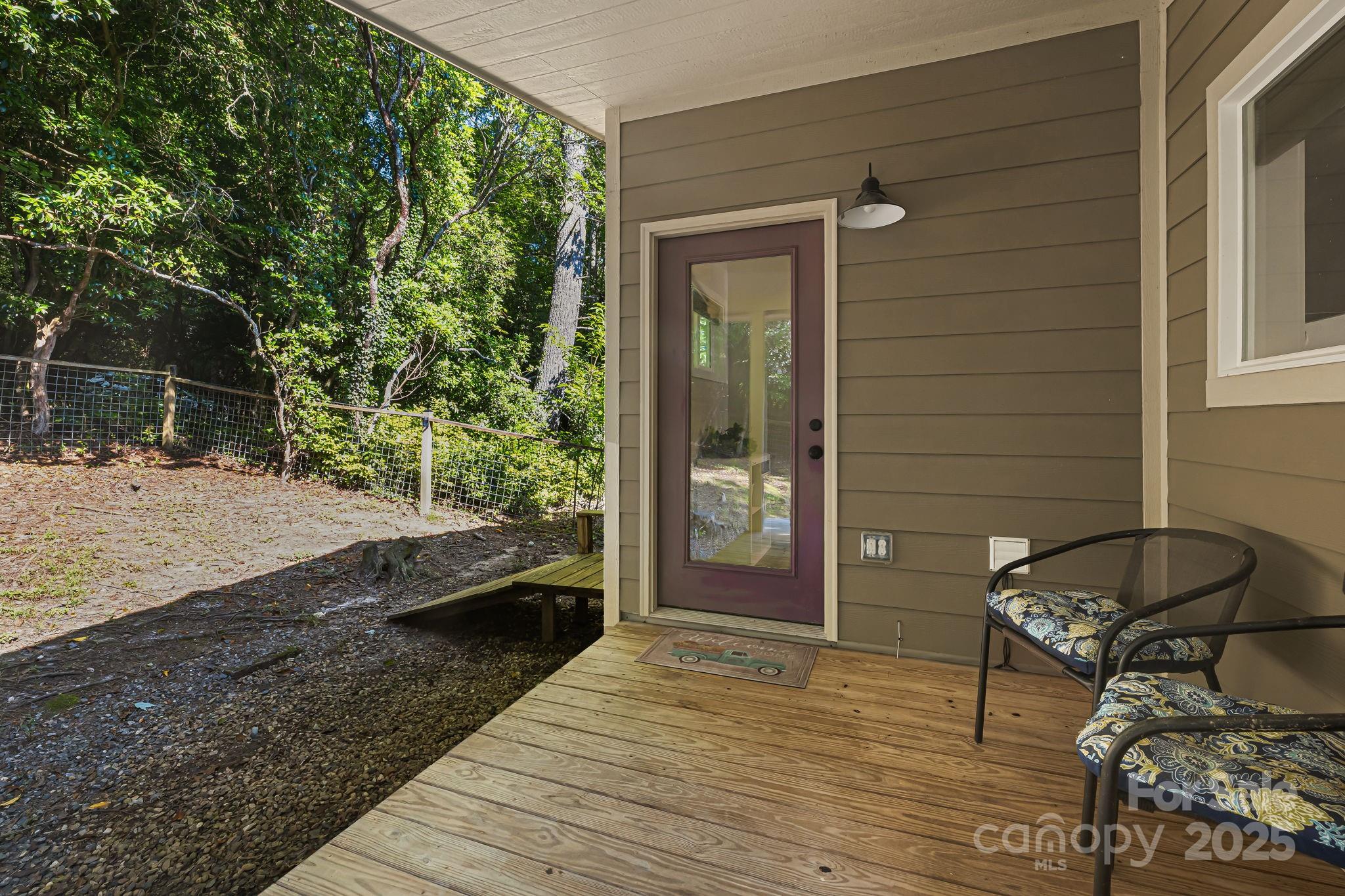 1101 Line Runner Ridge Road Rosman, NC 28772 - Photo 9 of 47 a view of a porch with furniture and yard