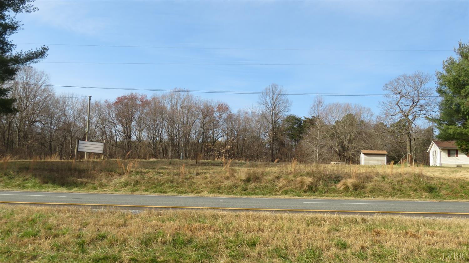 9838 Wards Road Rustburg, VA 24588 - Photo 2 of 9 a view of a yard with trees