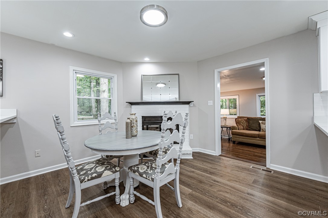 12529 Nash Road Chesterfield, VA 23838 - Photo 5 of 20 a view of a dining room with furniture and wooden floor