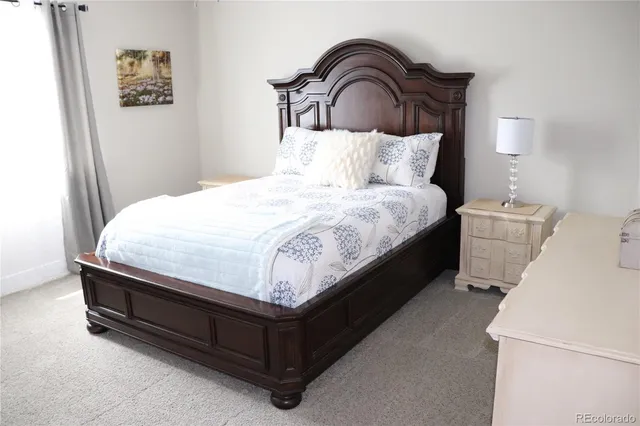 a bathroom with a window a sink and a window