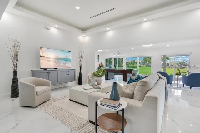 a living room with furniture and a window