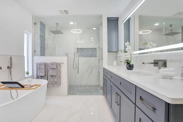 a bed room with a bed and a large window