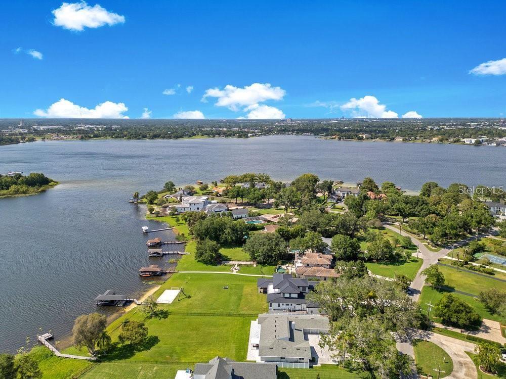 49 Interlaken Road Orlando, FL 32804 - Photo 47 of 61 a view of a swimming pool with a lake view