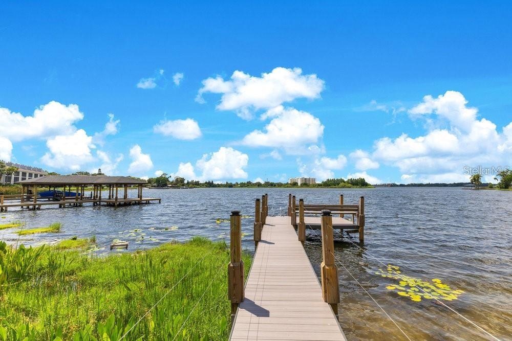 49 Interlaken Road Orlando, FL 32804 - Photo 55 of 61 a view of a lake with table and chairs