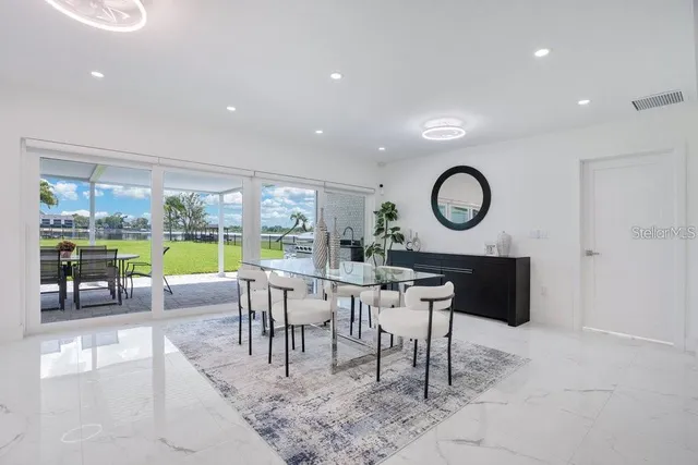 a view of a work space with a large window