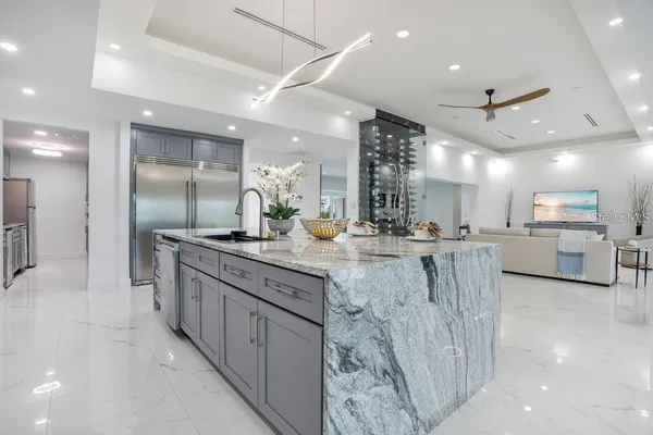 a bathroom with a granite countertop sink mirror and a