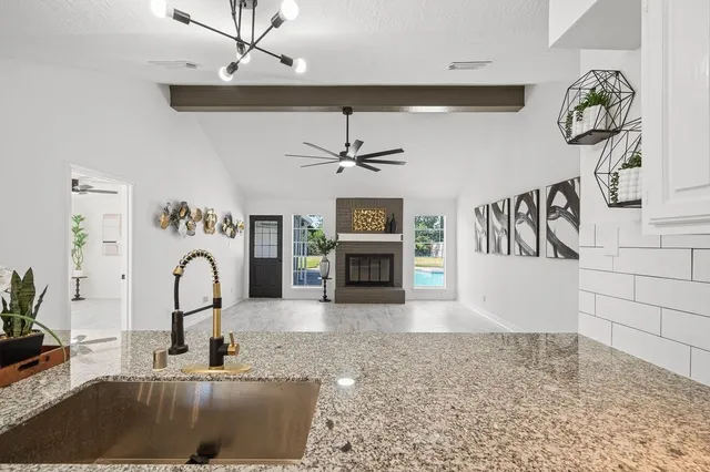 a view of kitchen with furniture and cabinets