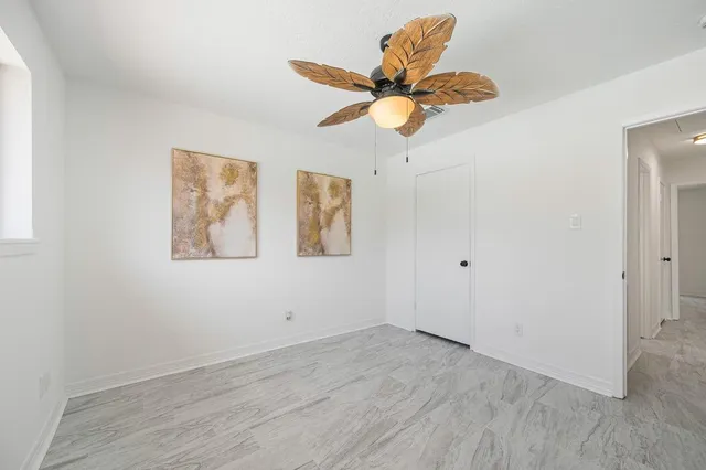 a view of a swimming pool with a yard