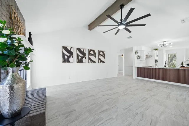 a view of a livingroom with a potted plant