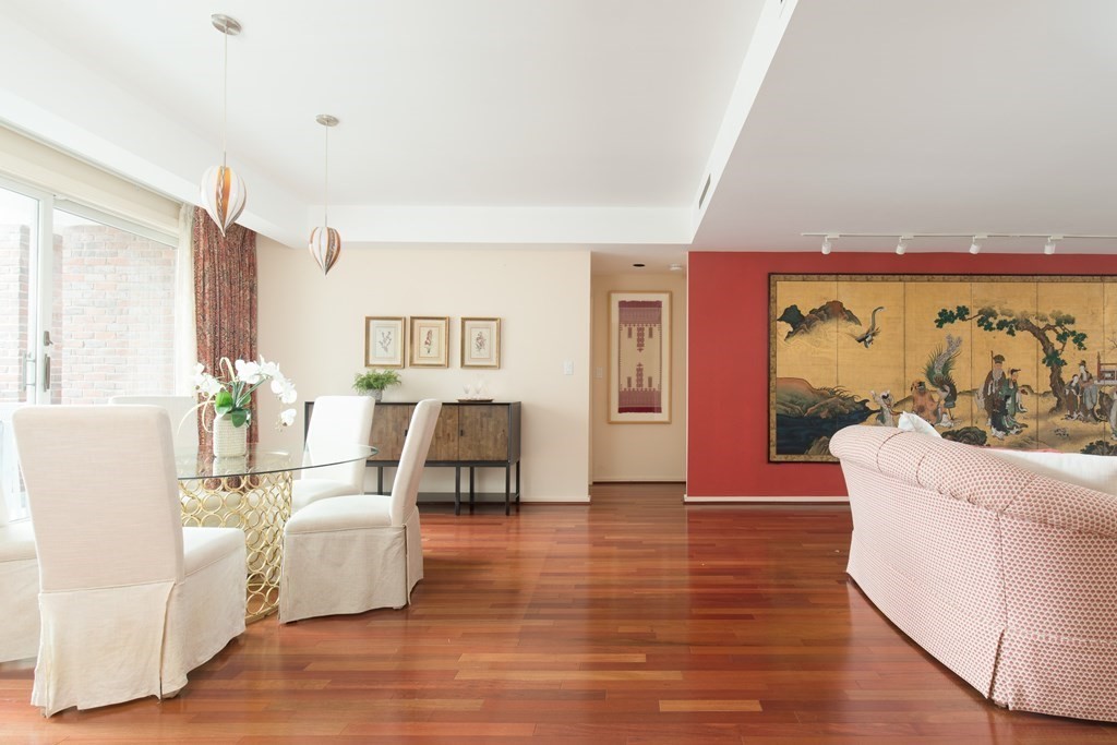 130 Mt Auburn Street, Unit 310 Cambridge, MA 02138 - Photo 4 of 21 a living room with furniture and a large window