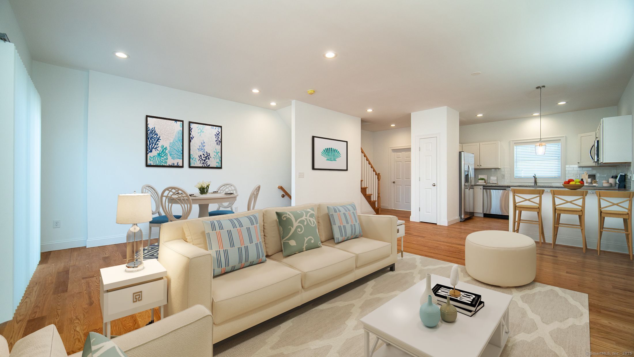 10 Fort Hill Road, Unit 6C Groton, CT 06340 - Photo 2 of 24 a living room with furniture and a view of kitchen