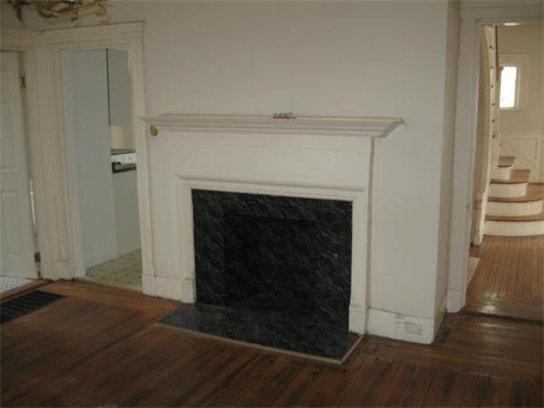45 Algonquin Street Boston, MA 02124 - Photo 3 of 10 a living room with a fireplace
