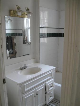 45 Algonquin Street Boston, MA 02124 - Photo 6 of 10 a bathroom with a sink and a mirror