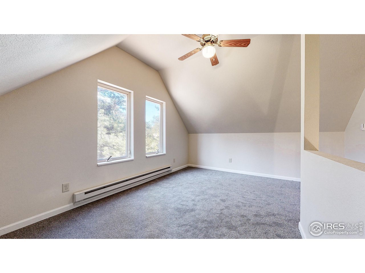 80 Hot Spur Lane Drake, CO 80515 - Photo 22 of 40 a open hall with a ceiling fan
