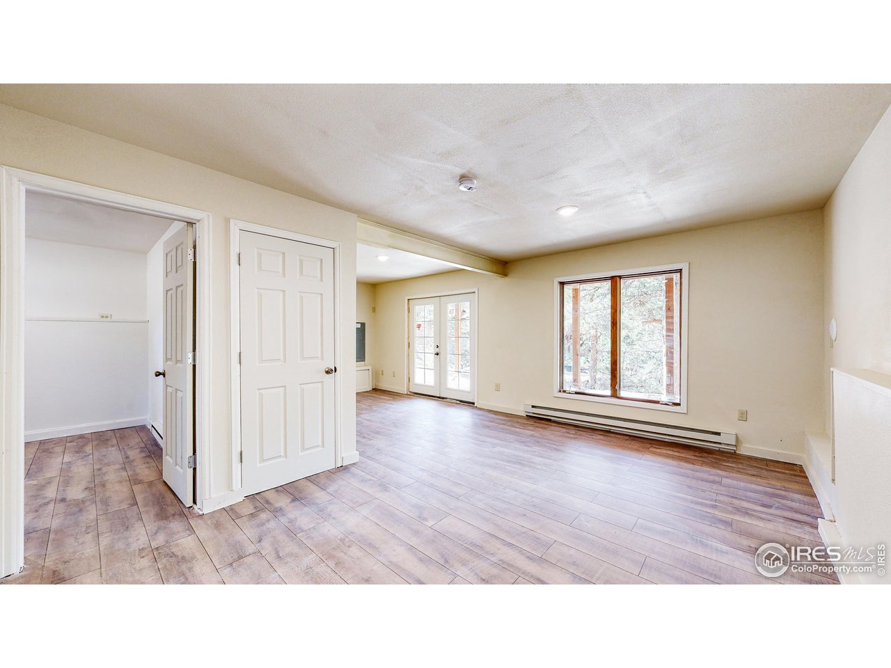 80 Hot Spur Lane Drake, CO 80515 - Photo 29 of 40 a open hall with wooden floor