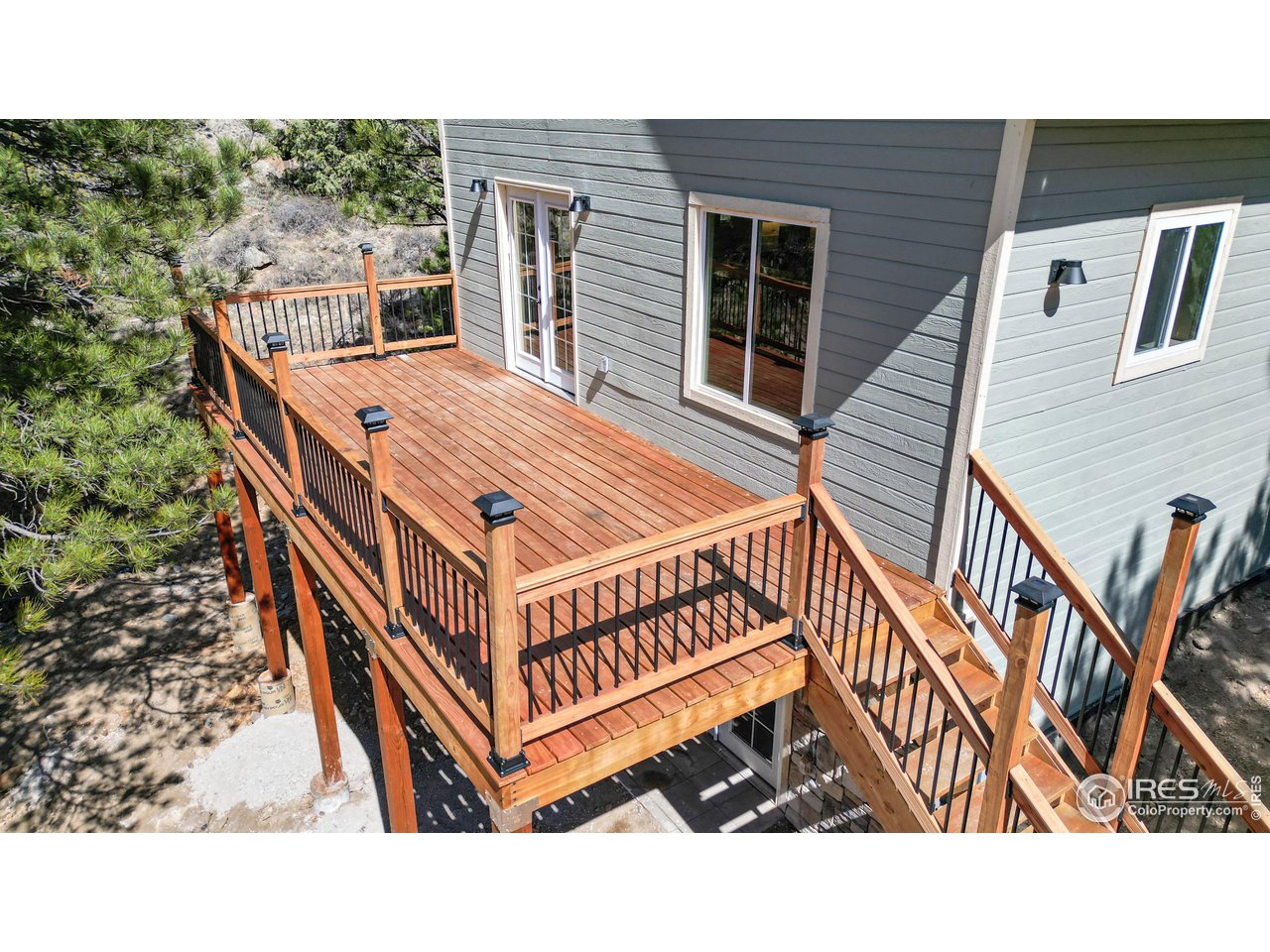 80 Hot Spur Lane Drake, CO 80515 - Photo 37 of 40 a balcony with table and chairs