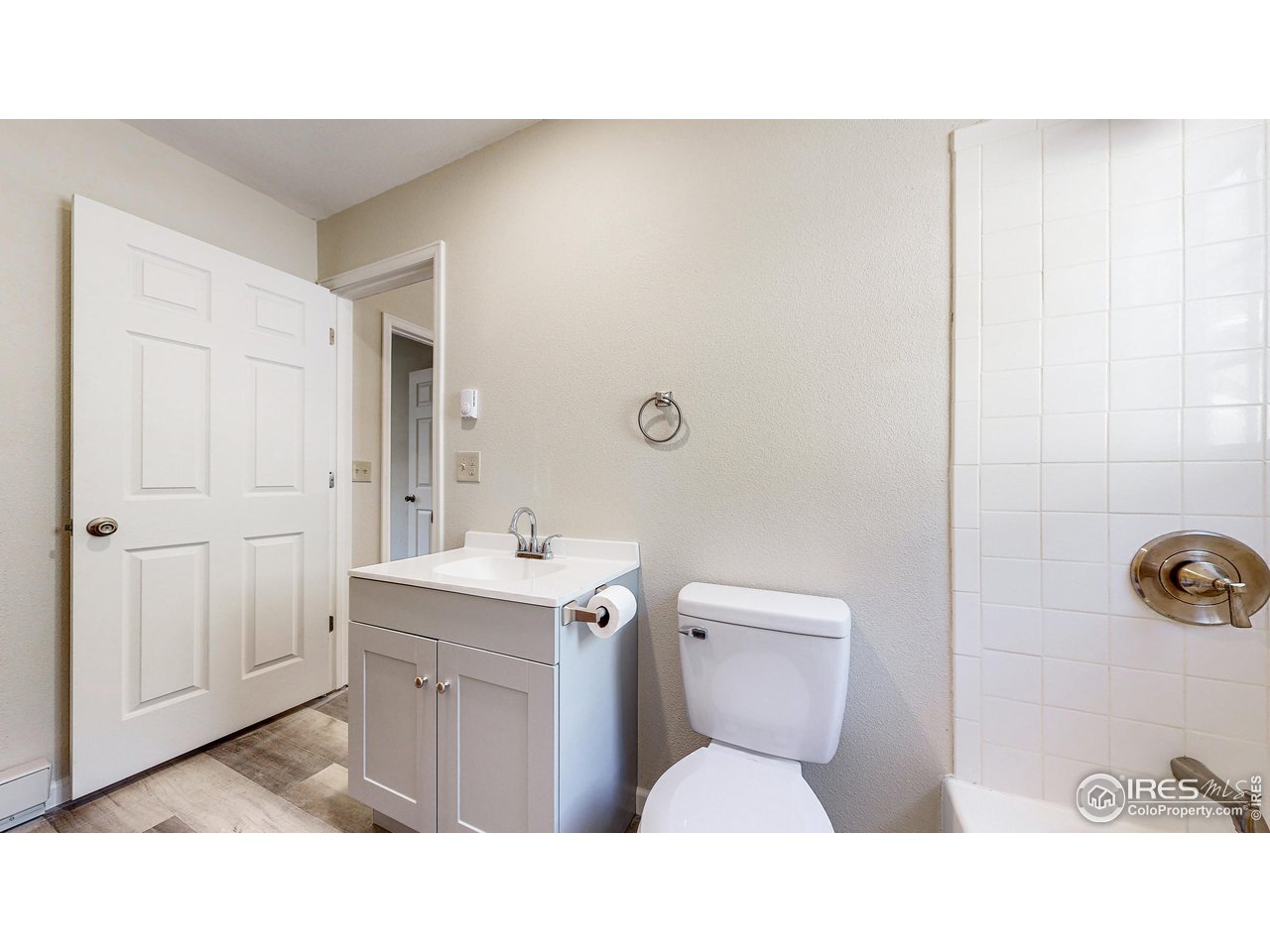 80 Hot Spur Lane Drake, CO 80515 - Photo 10 of 40 a bathroom with a toilet a sink and mirror