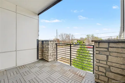 a view of a balcony with an outdoor space