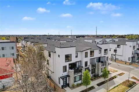 a view of city with tall buildings