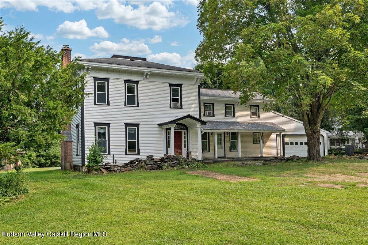 1670 County Rte 30 Salem, NY 12865 - Photo 1 of 59 a front view of a house with a yard