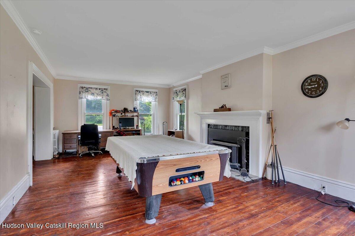1670 County Rte 30 Salem, NY 12865 - Photo 20 of 59 a living room with furniture and a fireplace