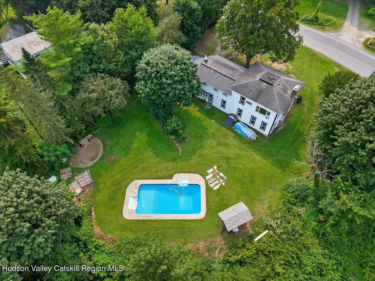 1670 County Rte 30 Salem, NY 12865 - Photo 2 of 59 an aerial view of a house with a garden and swimming pool