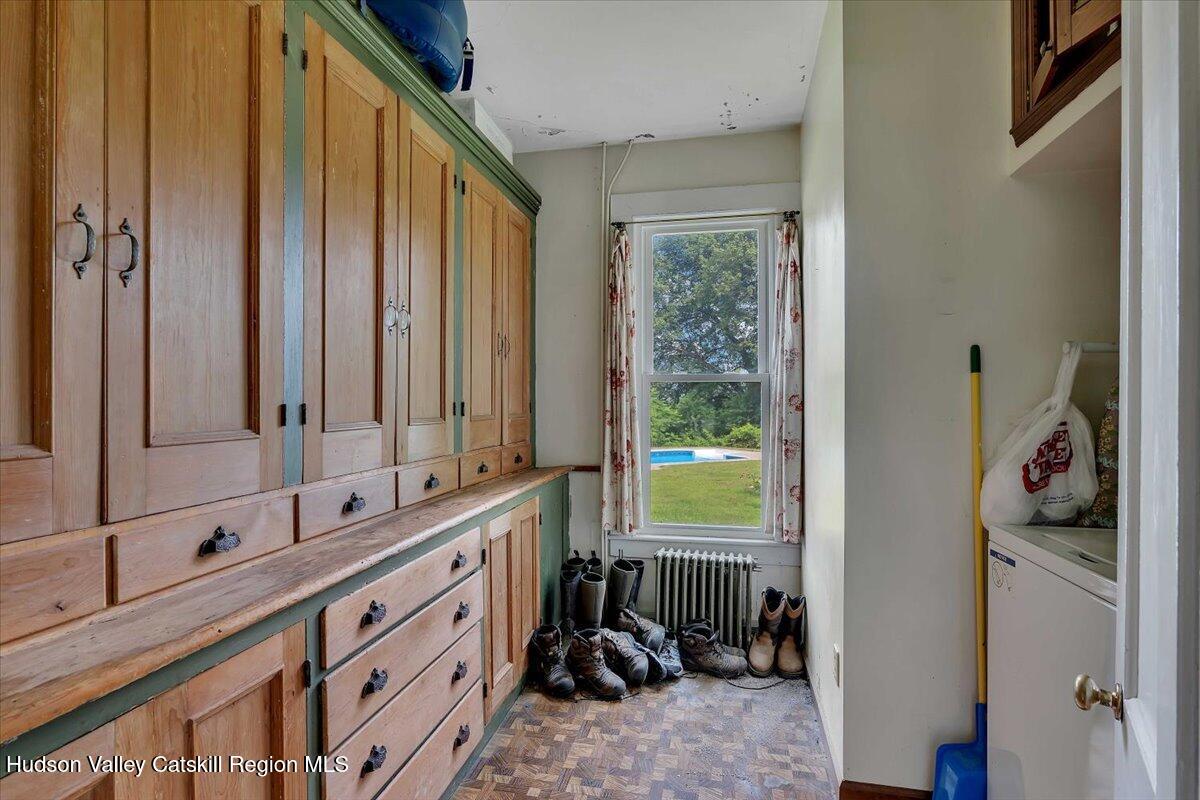 1670 County Rte 30 Salem, NY 12865 - Photo 26 of 59 a bathroom with a double vanity sink a mirror and a bathtub