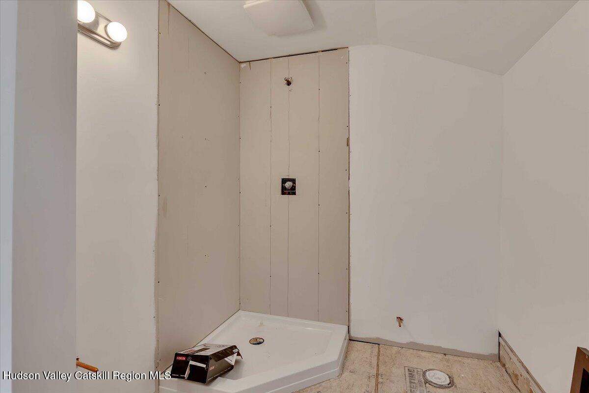1670 County Rte 30 Salem, NY 12865 - Photo 35 of 59 a bathroom with a tub and shower