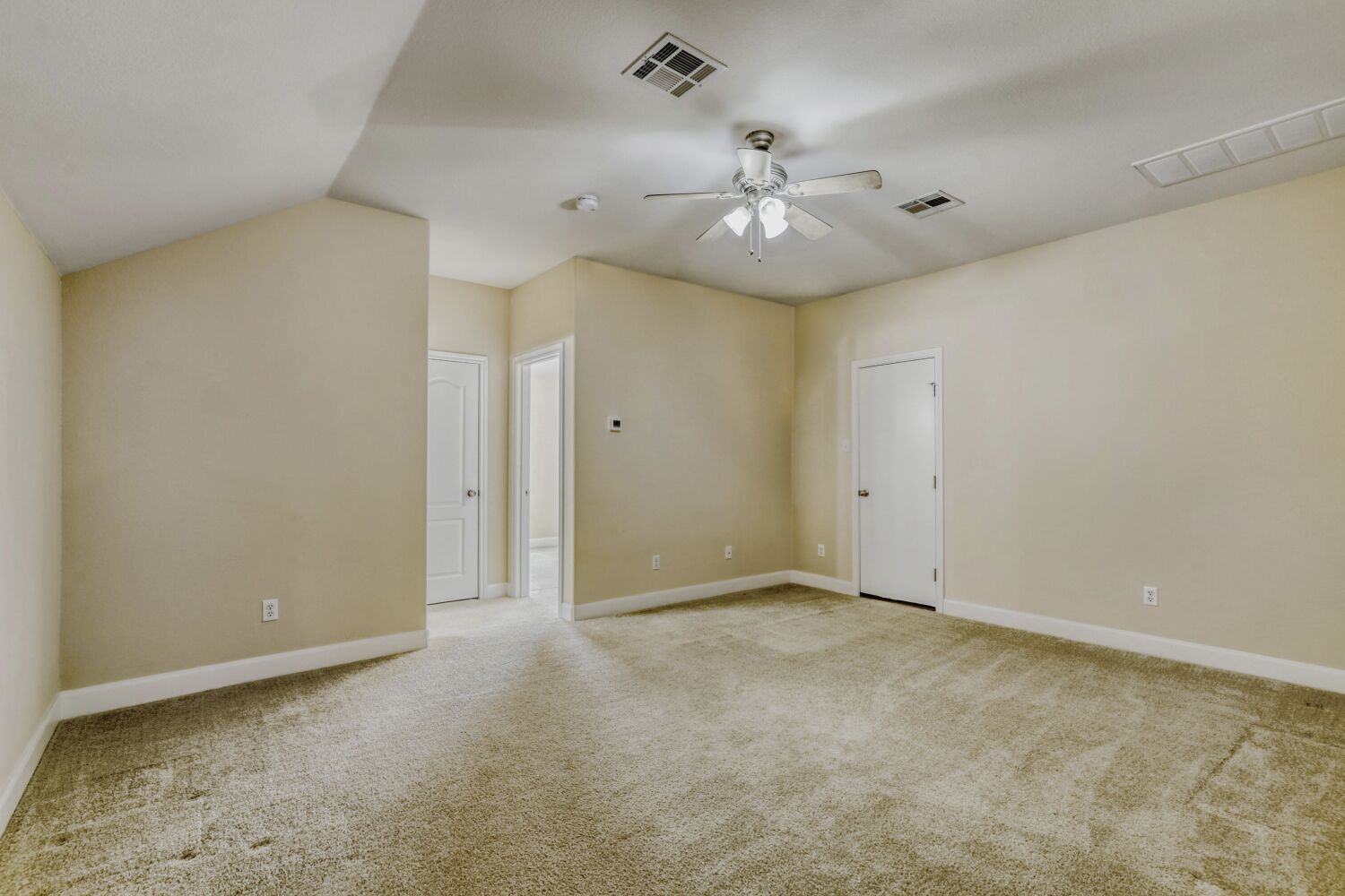 24 Stone Terrace Drive Austin, TX 78734 - Photo 24 of 31 Game room or TV media room, featuring light carpet, a ceiling fan, and vaulted ceiling