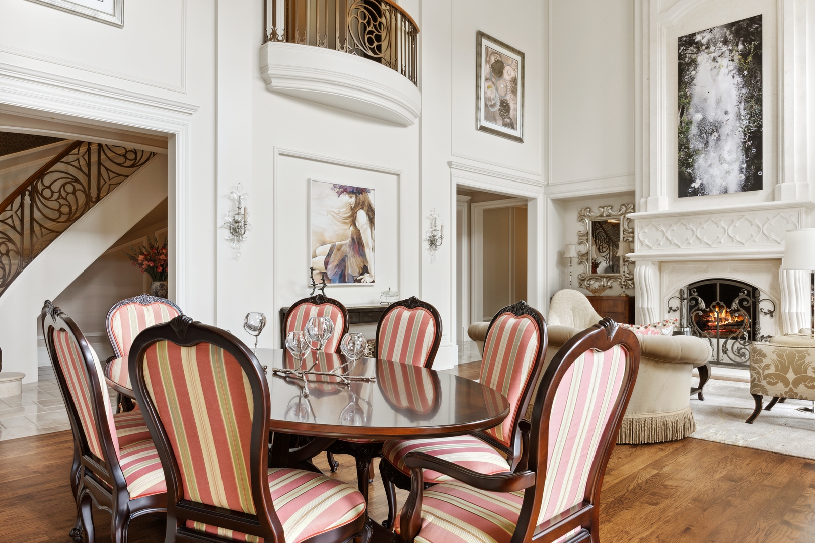 106 Longmeadow Road Winnetka, IL 60093 - Photo 11 of 66 a dining room with furniture a fireplace a rug and a painting