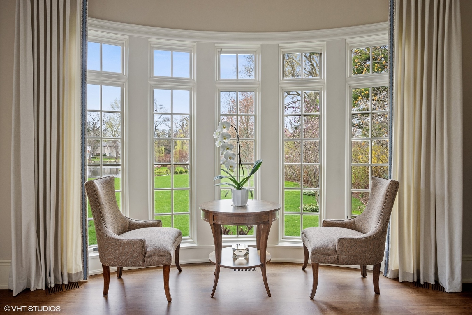 106 Longmeadow Road Winnetka, IL 60093 - Photo 22 of 66 a dining room with furniture a fireplace and wooden floor