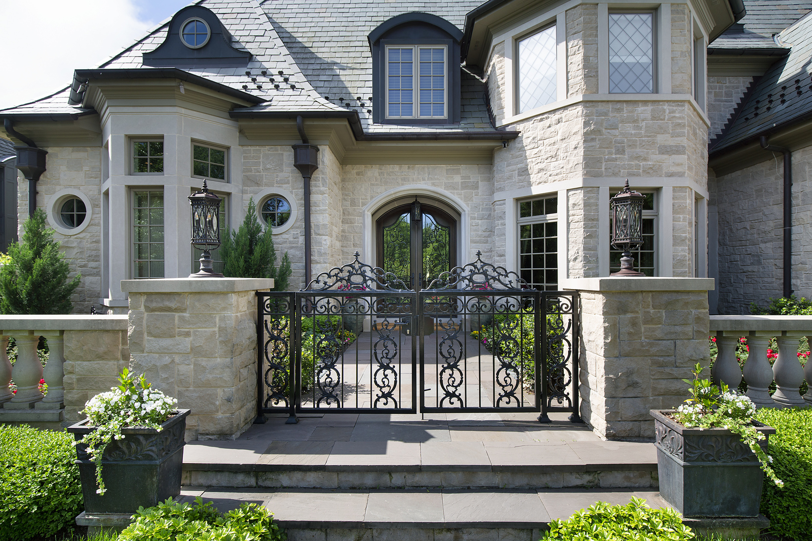 106 Longmeadow Road Winnetka, IL 60093 - Photo 3 of 66 a front view of a house with plants