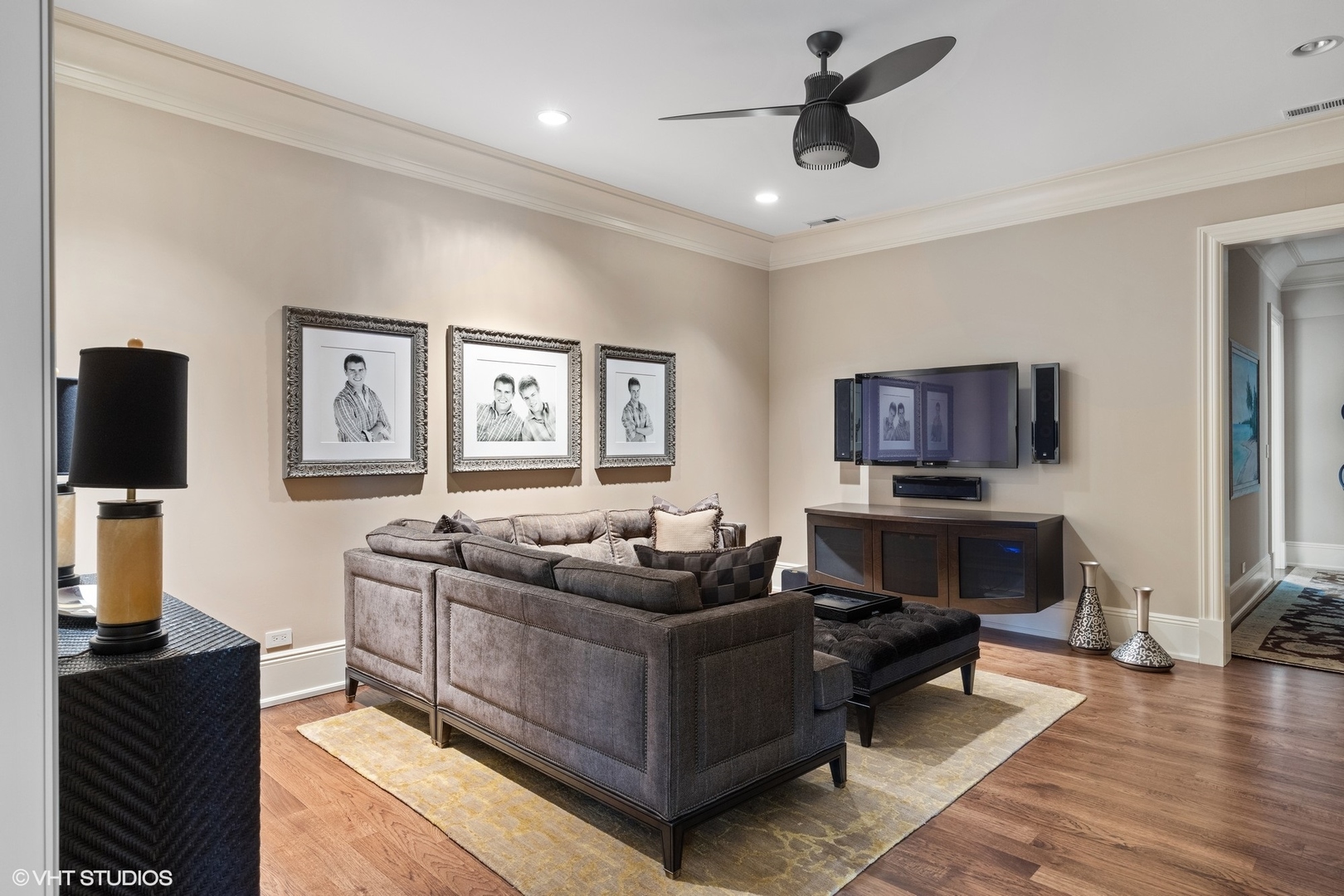 106 Longmeadow Road Winnetka, IL 60093 - Photo 43 of 66 a living room with furniture a flat screen tv and a fireplace