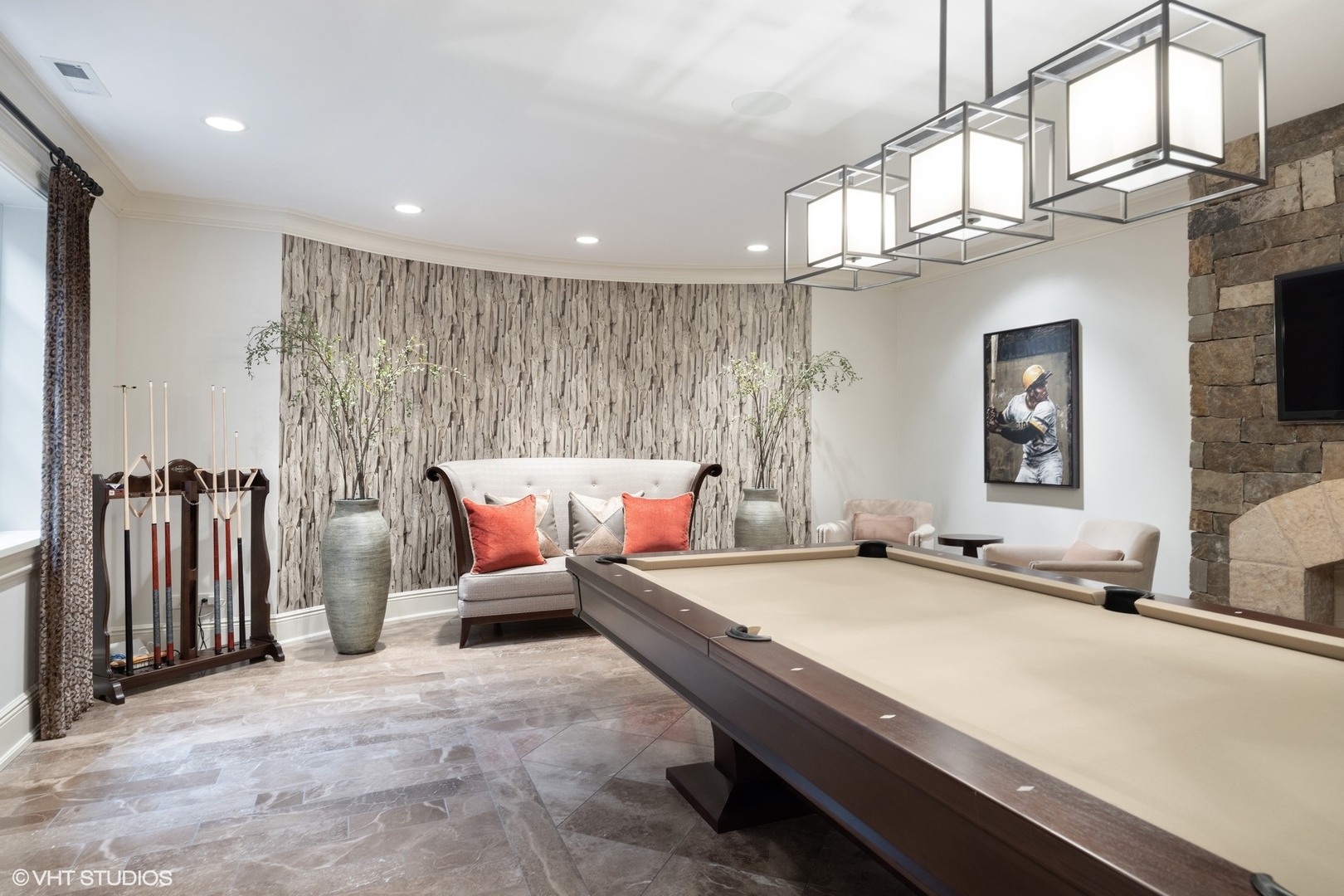 106 Longmeadow Road Winnetka, IL 60093 - Photo 50 of 66 a living room with furniture a chandelier and a fireplace