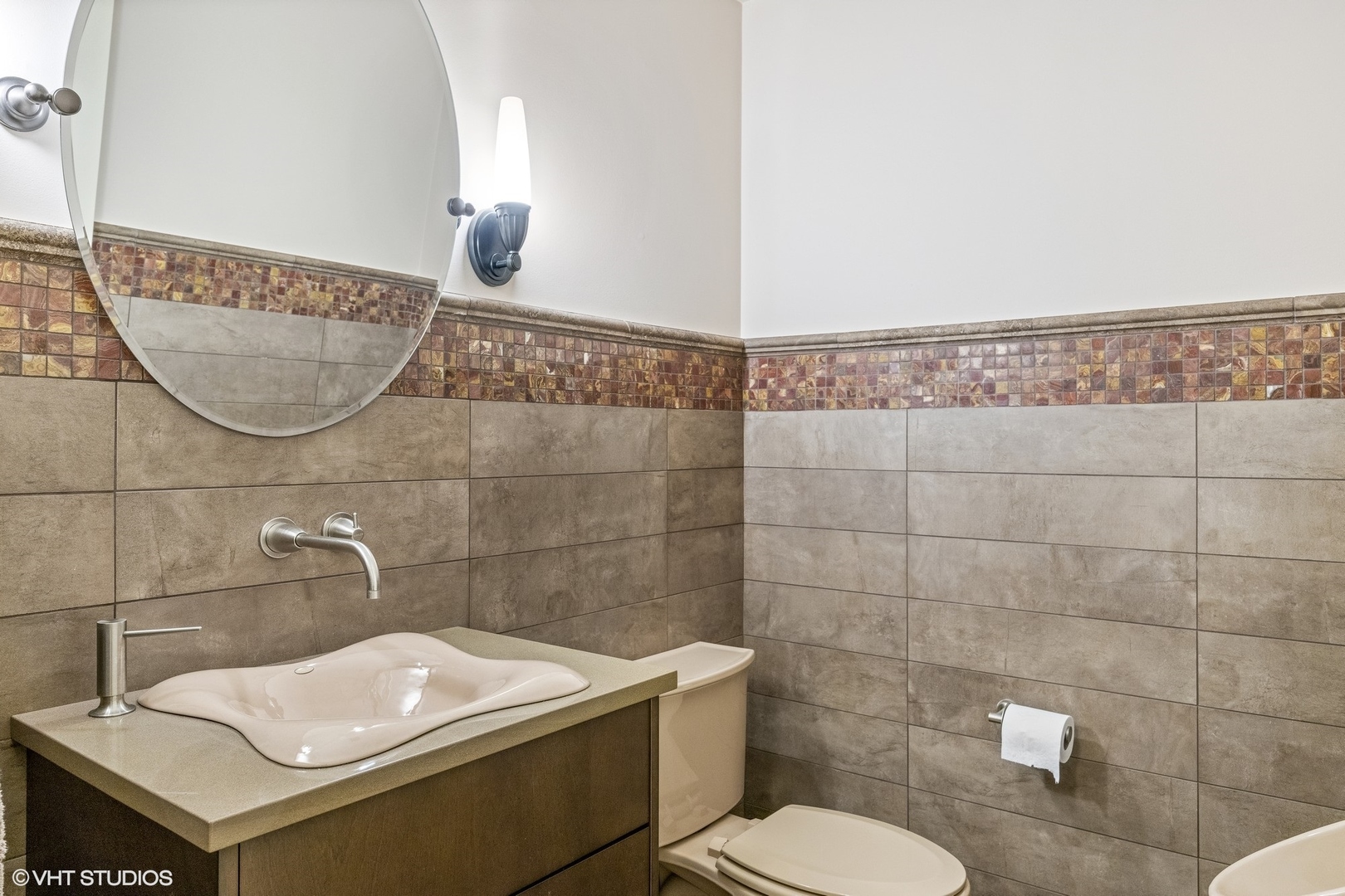 106 Longmeadow Road Winnetka, IL 60093 - Photo 54 of 66 a bathroom with a sink a toilet and a mirror