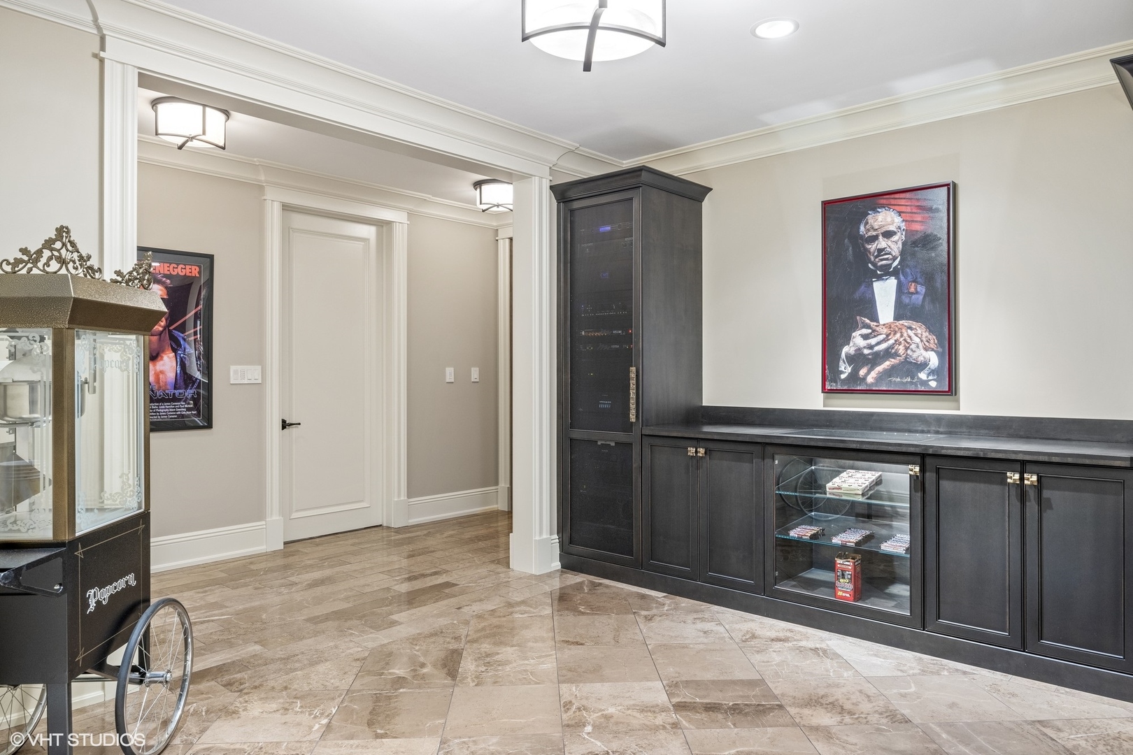 106 Longmeadow Road Winnetka, IL 60093 - Photo 60 of 66 a view of a hallway with paintings on the wall