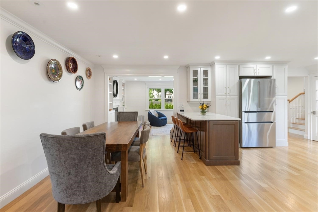 155 Adams Avenue Newton, MA 02465 - Photo 8 of 37 a view of a dining room with furniture and wooden floor