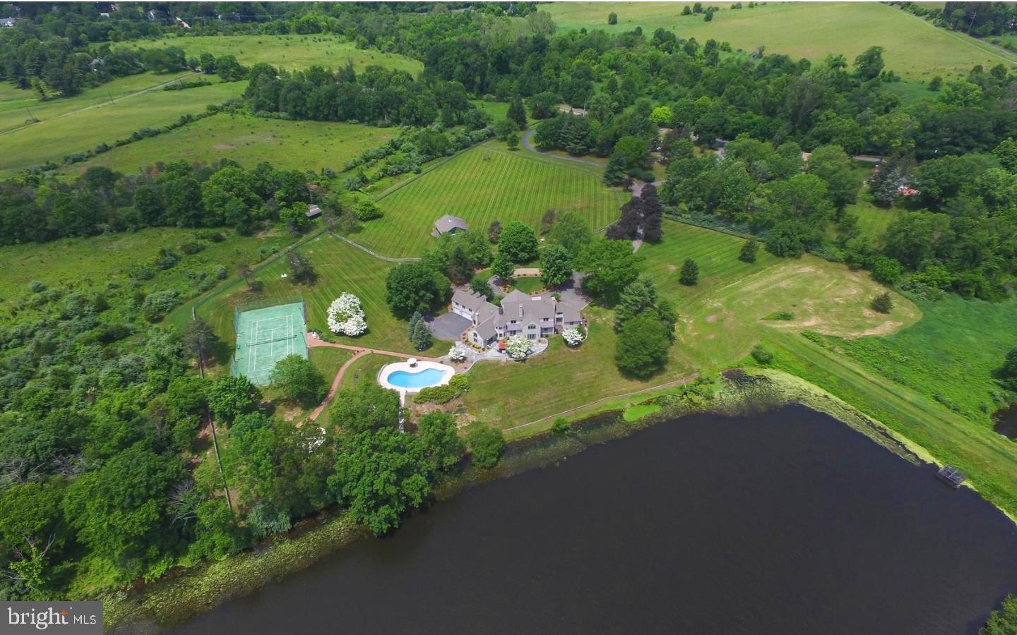 463 Federal City Road Pennington, NJ 08534 - Photo 2 of 47 10+ acre views of lake, tennis court, pool & barn.