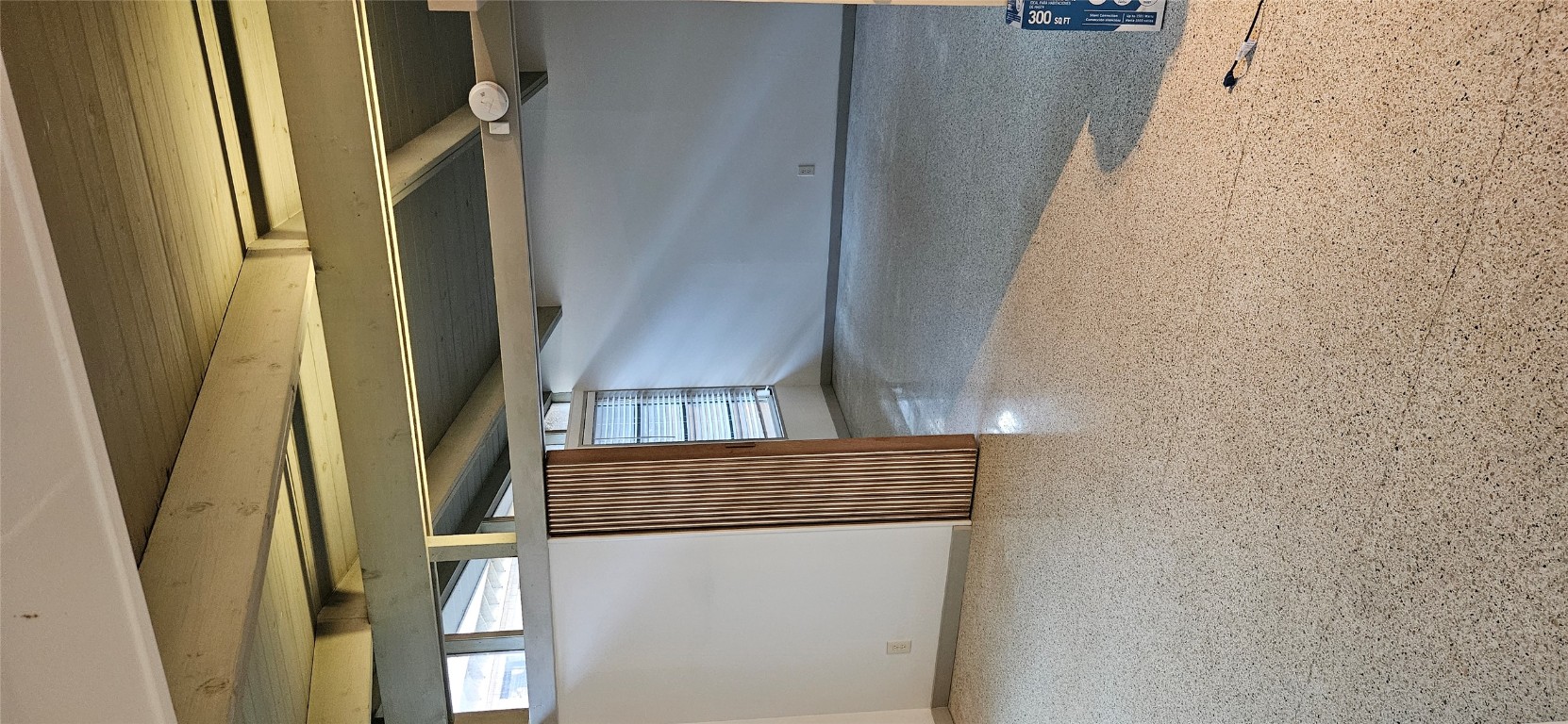 506 West 7th Street, Unit B Austin, TX 78701 - Photo 8 of 14 Below grade area with baseboards