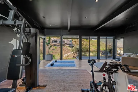 a view of a room with gym equipment