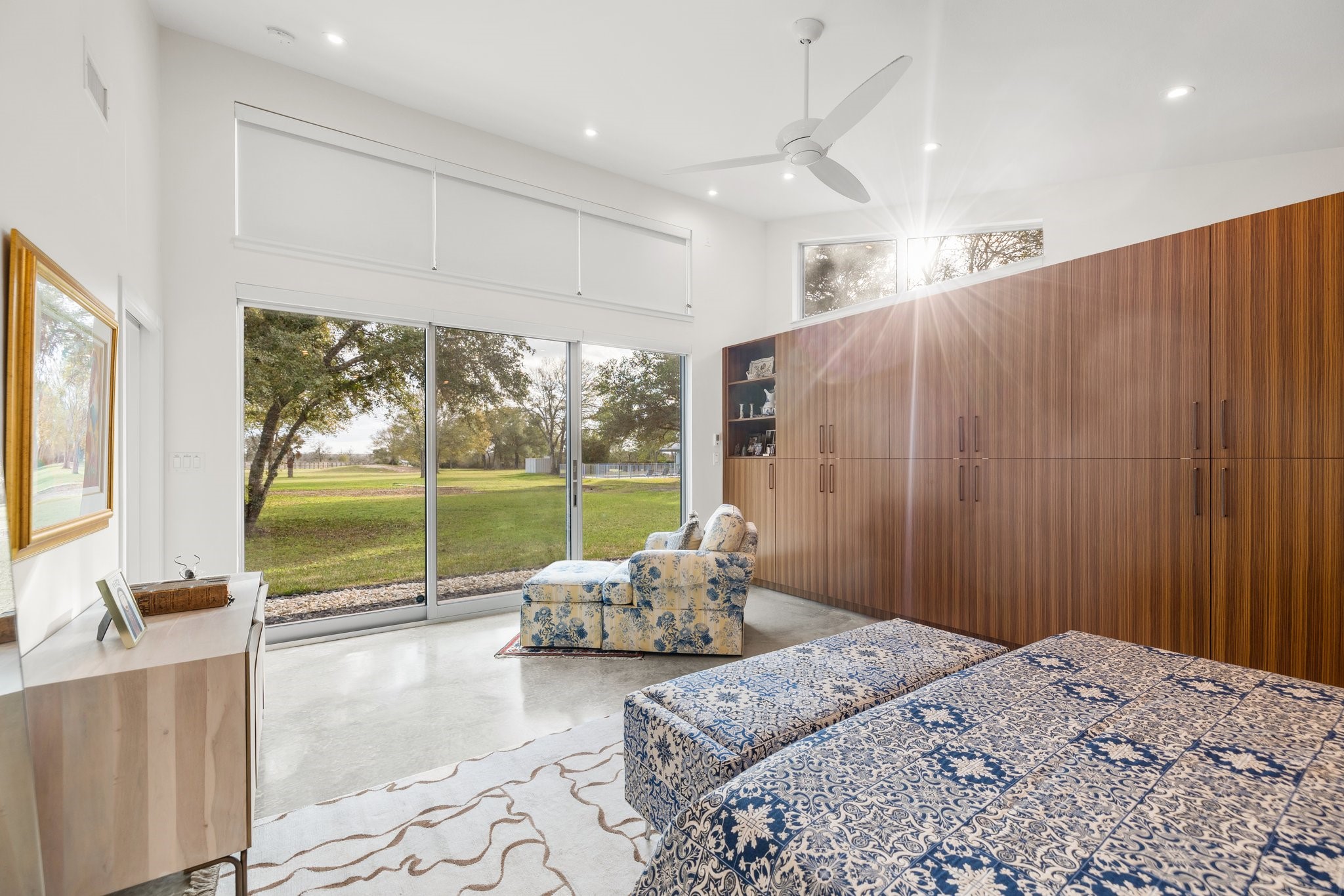 1585 Round Top Road Round Top, TX 78954 - Photo 18 of 26 a bed room with a bed and a large window