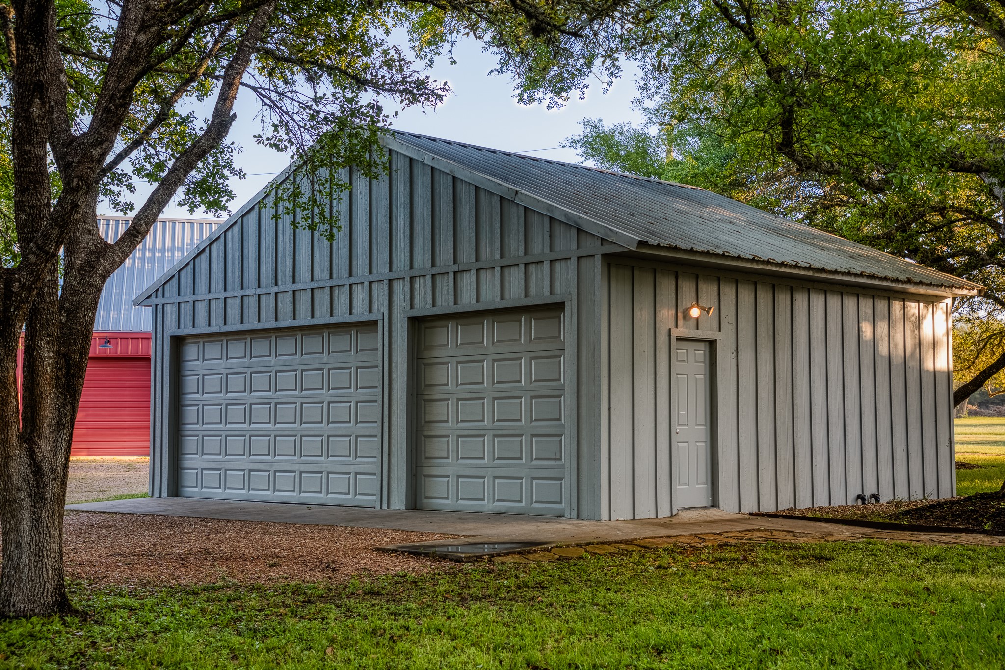 1585 Round Top Road Round Top, TX 78954 - Photo 22 of 26 a backyard of a house with lots of green space