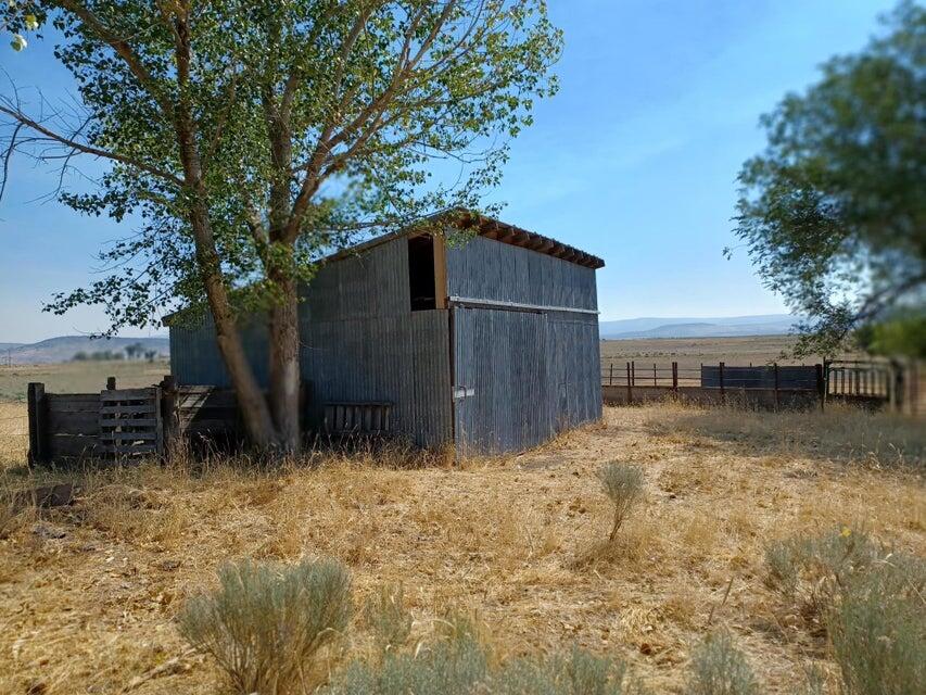 557-435 Center School House Road Bieber, CA 96009 - Photo 12 of 24 a backyard of a house with lots of green space