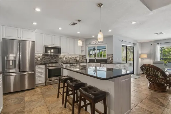 $645,000 | 4725 Orange Grove Way, Palm Harbor, FL 34684