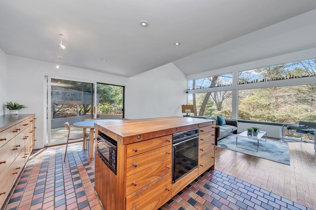 2 Field Road Lexington, MA 02421 - Photo 11 of 32 a kitchen with a stove and a wooden floor