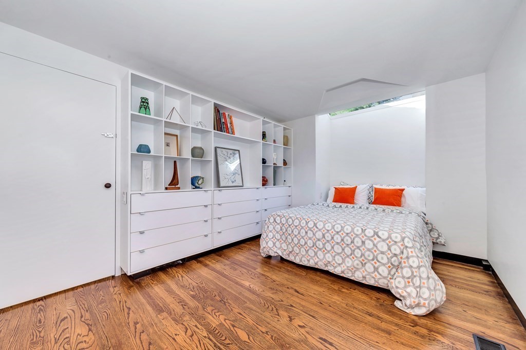 2 Field Road Lexington, MA 02421 - Photo 16 of 32 a room with furniture and window