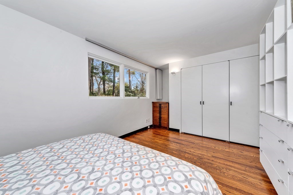 2 Field Road Lexington, MA 02421 - Photo 17 of 32 a bedroom with a bed and a window